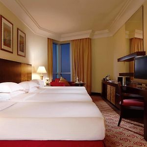 Classic Quadruple Room Four Single Bed City View